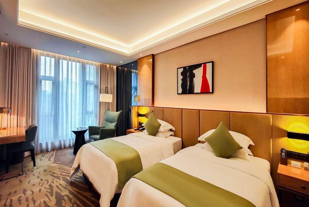 Leshan Ramada Hotel Rum bild
